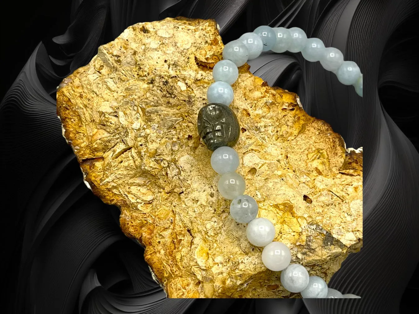 Aquamarine gemstones and Pyrite Skull stretch Bracelet