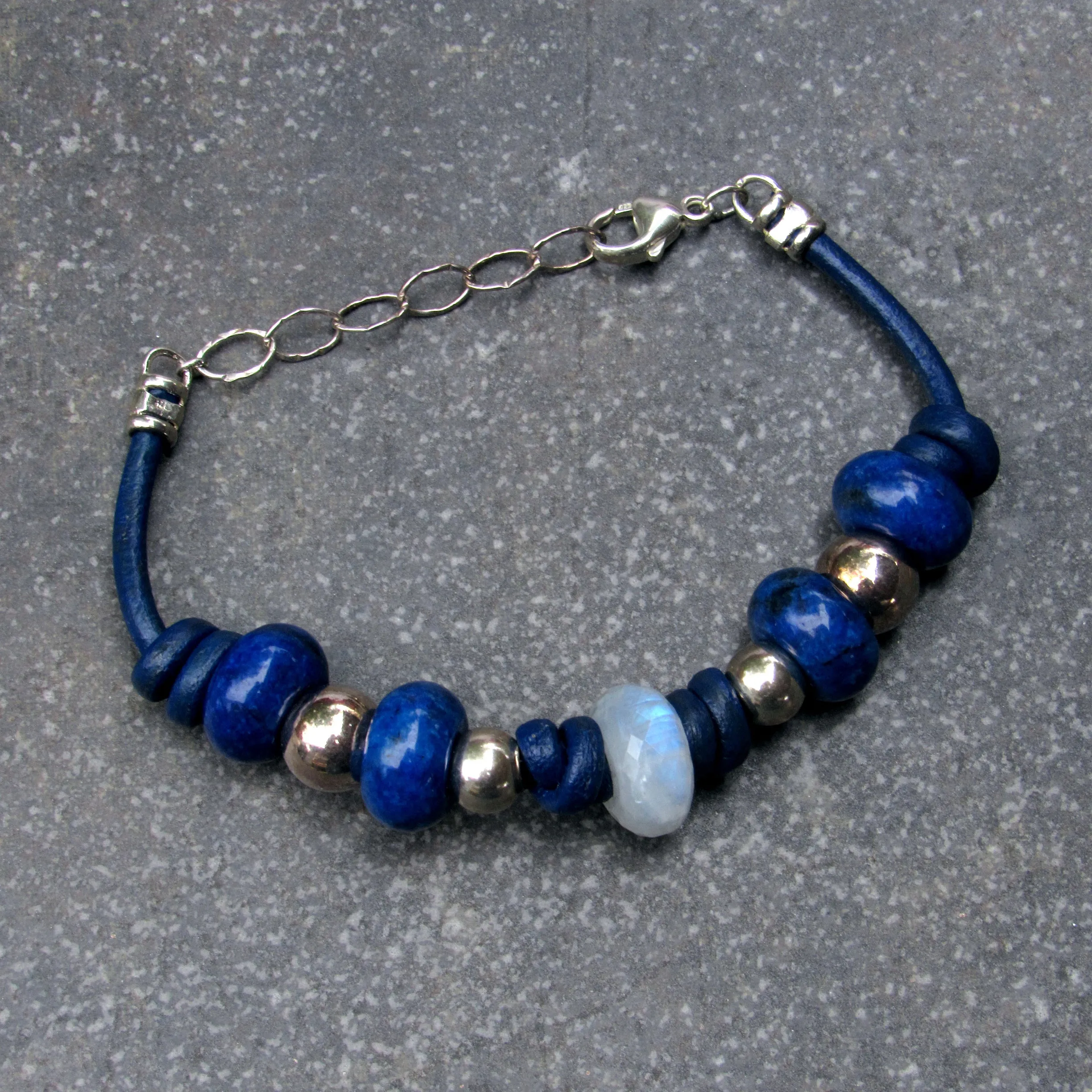 Moonstone center stone with Lapis Lazuli gemstones, and Sterling Silver leather bracelet