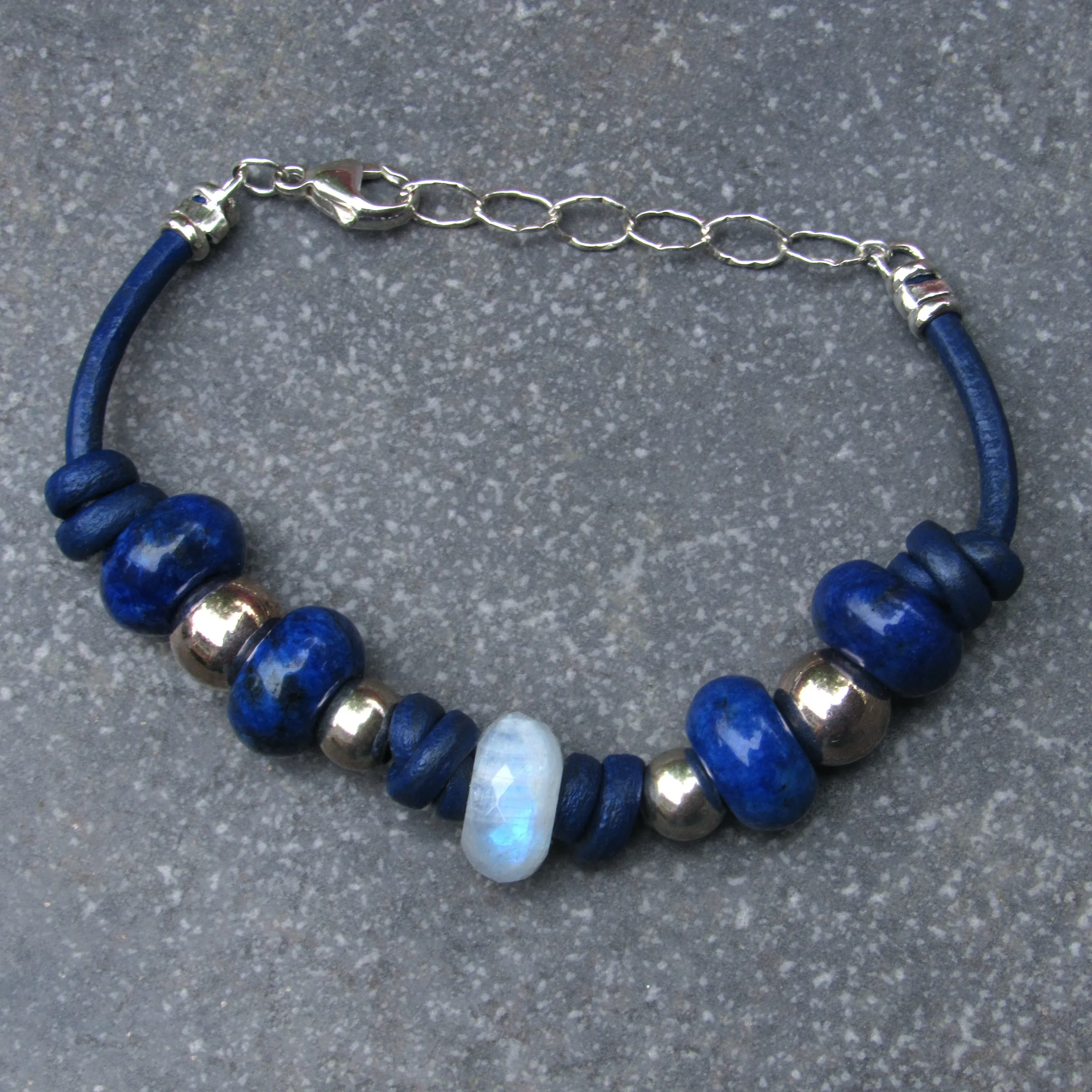 Moonstone center stone with Lapis Lazuli gemstones, and Sterling Silver leather bracelet