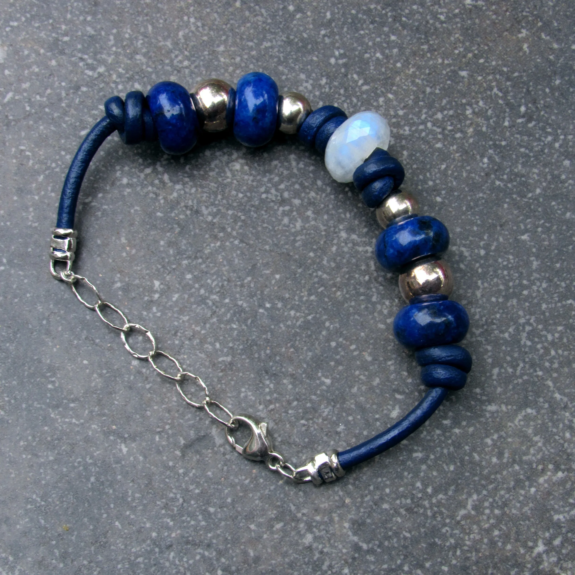 Moonstone center stone with Lapis Lazuli gemstones, and Sterling Silver leather bracelet