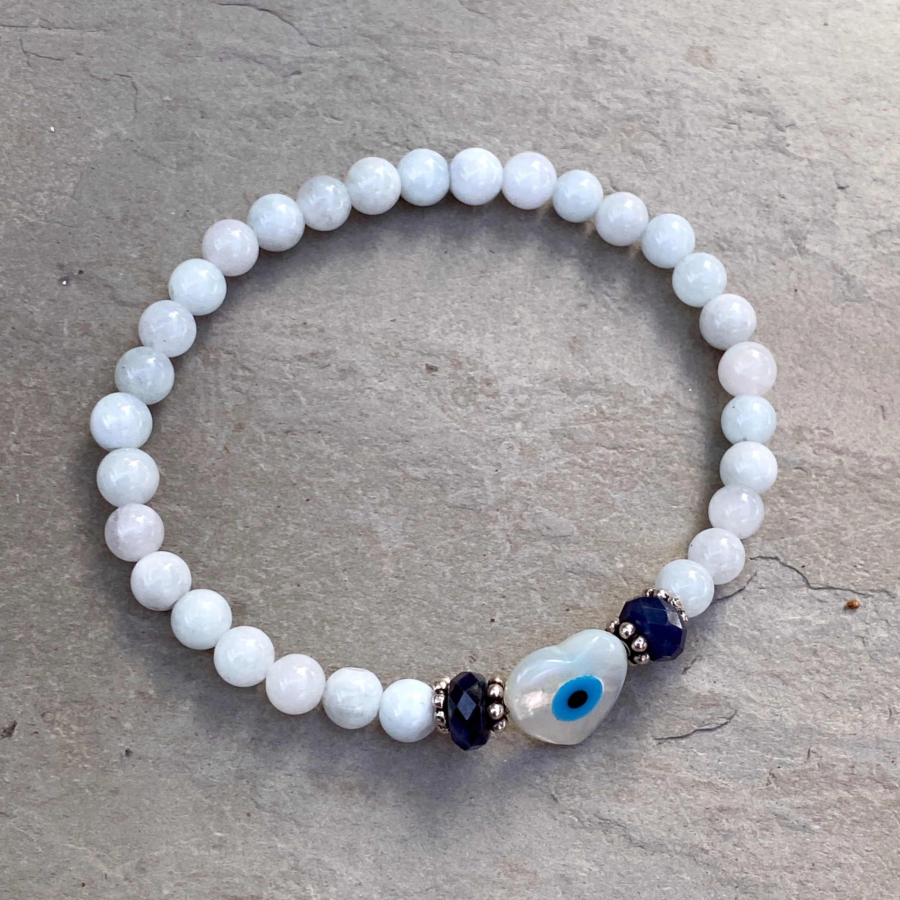 Mother of Pearl, Aquamarine gemstones, and Blue Sapphires with Sterling Silver bracelet