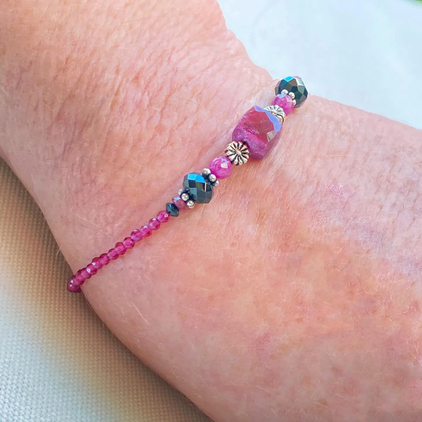 Ruby, Black Spinel, Red Spinel gemstones, and Sterling Silver Bracelet